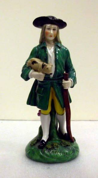 Figurine: Man Holding a Pig in His Right Hand and a Walking Stick in His left Hand
