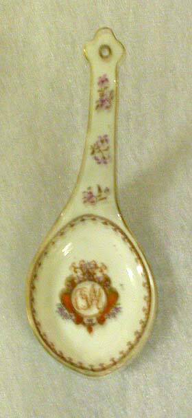 Serving Spoon with a Cartouche Surrounding a Monogram in the Center of the Bowl