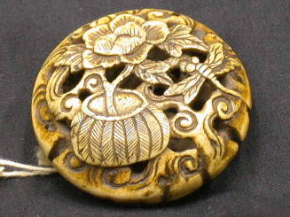 Ryūsa-type Netsuke with Flower and Dragonfly Design