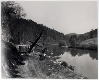 "Power shovel at work on roadway at Norris Dam site on the Clinch River. The steep hillsides are characteristic of the general topography of the region.", 10/30/1933