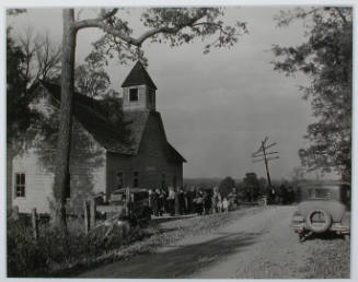 "A little country church, Sharps Station M.E. Church, near Loyston, Tennessee. Congregation leaving at close of the service. This church will be submerged by the waters of the Norris Dam reservoir.", 10/29/1933