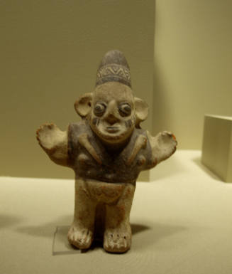 Female Figurine With Woven Cap