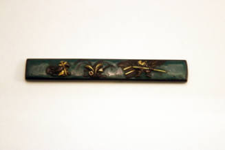 Kozuka Handle with Design of Two Figures in Landscape
