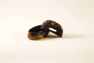 Kachira and Fuchi with Design of a Dragon and Vines