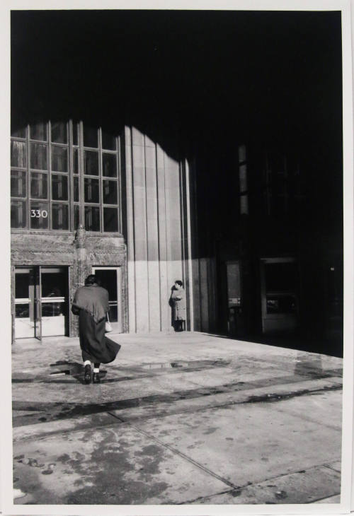 Woman Entering an Office Building