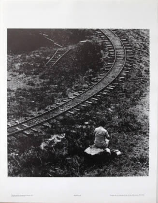 Woman by the Railroad Tracks