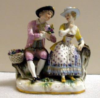 Figurine: Seated Man and Woman with Flowers