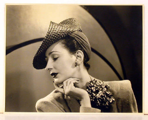 Untitled (Woman wearing hat, in three-quarter profile)