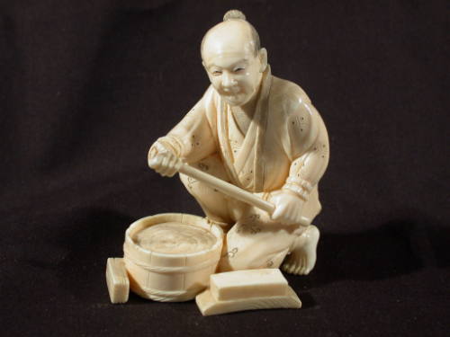 Okimono: Man with Large Wooden Tub