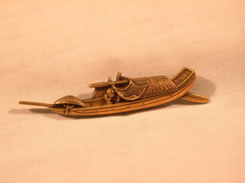 Menuki in the Form of Fisherman in a Covered Punt