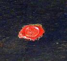 Detail of red seal on back of wood panel at cebter