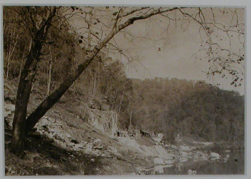 "A view of the test drilling shaft and the shop at the Norris Dam site on Clinch River.", 10/31/1933