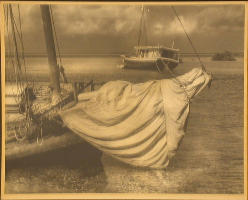 Two Sailboats Along Shore