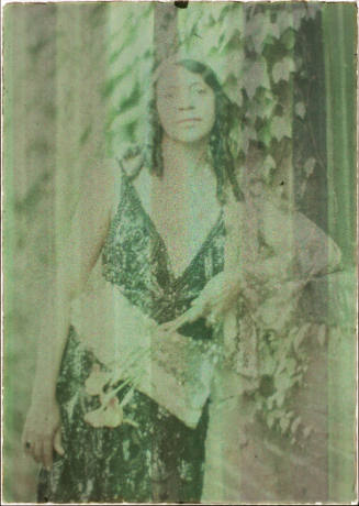 Woman in Formal Dress, Leaning against a Window Sill