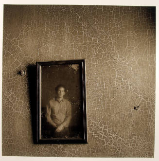 Portrait of a young man in an abandoned room