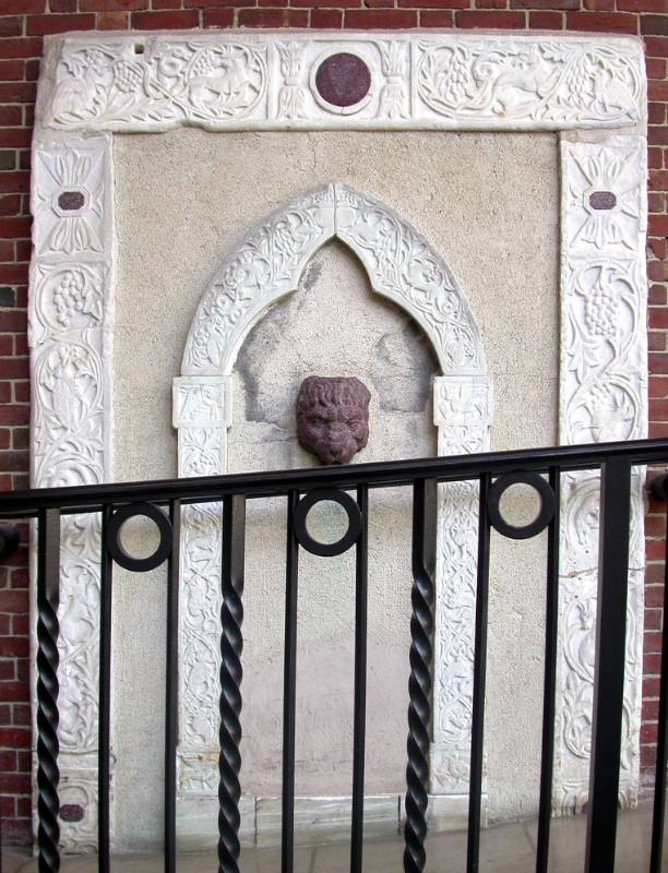 Roman Wall Fountain in the form of a Head of a Lion,  Venetian Gothic Arched Inner Frame and Byzantine Outer Frame carved in Low Relief