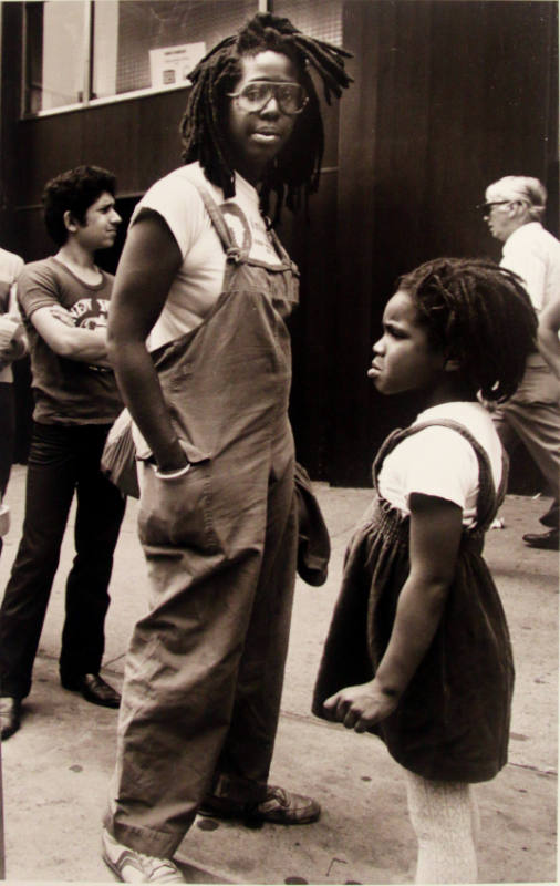 Woman in Overalls with Daughter, Times Square