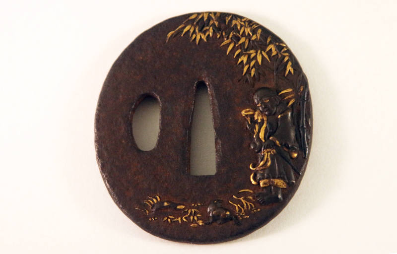 Tsuba: Design of a Figure under a Bamboo Tree