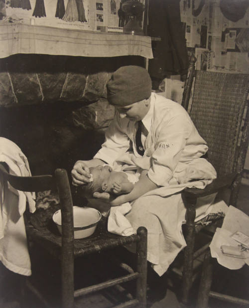 Nurse Bathing a Child