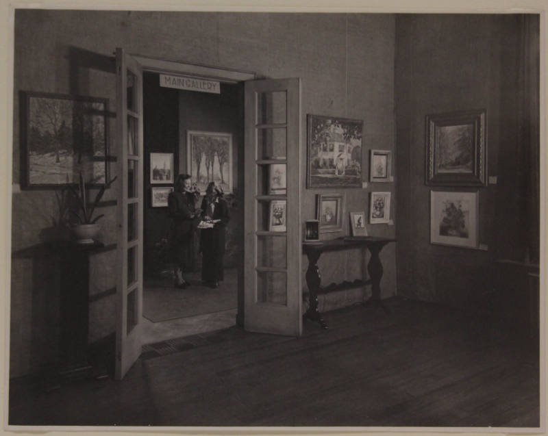 Jane Reece with a Visitor at her Riverview Ave. Studio, Showing the Entry Hall and Main Gallery Space