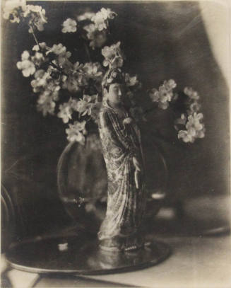 Still Life: Figure of guanyin and cherry blossoms