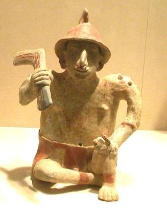 Seated Warrior With Axe Weapon And Trophy Head