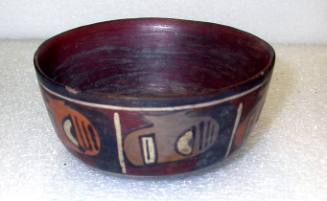 Bowl with Design of Faces Around Top